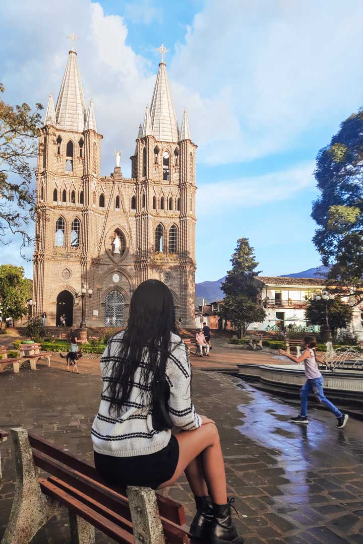 basilica-menor-jardin The iconic Basilica of the Immaculate Conception stands tall behind a central fountain in Jardín’s main square—one of the most picturesque things to do in Jardín, Colombia.