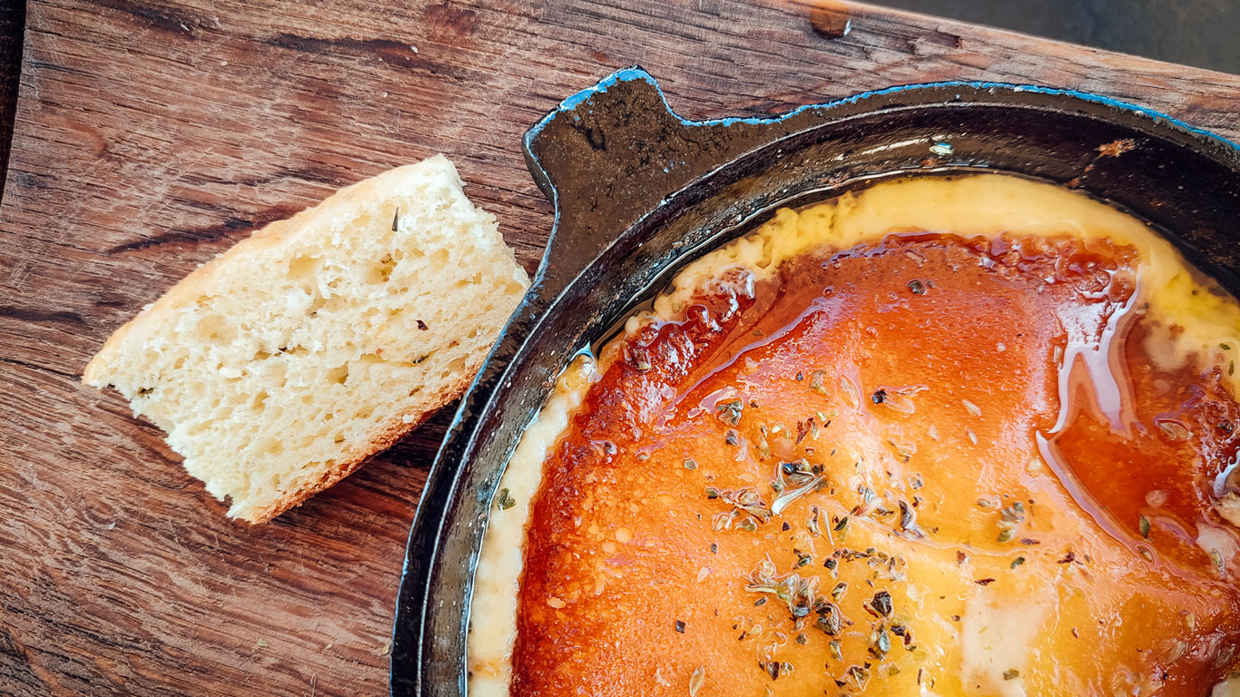 Provoleta served with toast at the Tempus Alba winery restaurant.
